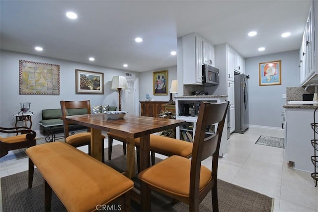 4140 Warner Blvd Unit 302, Burbank, CA 91505 - dining space featuring recessed lighting and light tile patterned flooring