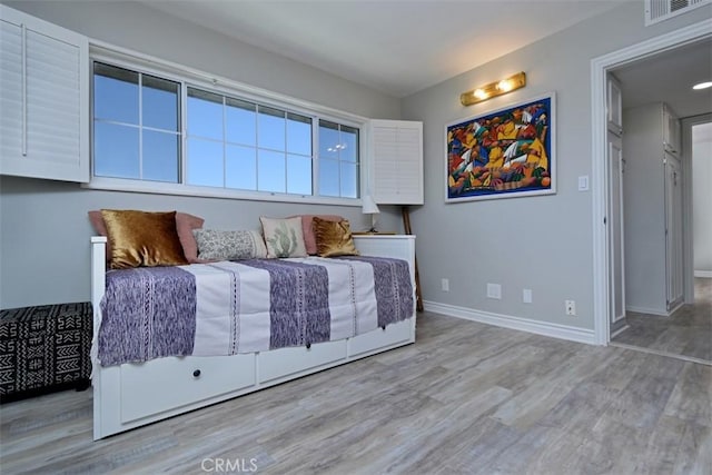 4140 Warner Blvd Unit 302, Burbank, CA 91505 - bedroom featuring wood finished floors
