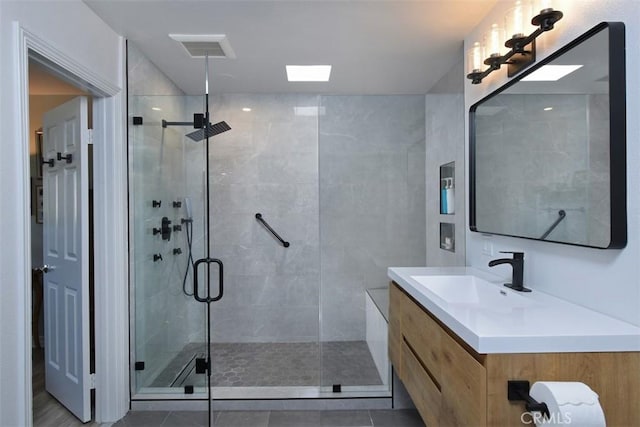 4140 Warner Blvd Unit 302, Burbank, CA 91505 - bathroom with a stall shower, vanity, and tile patterned flooring