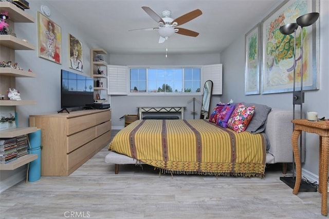 4140 Warner Blvd Unit 302, Burbank, CA 91505 - bedroom featuring light wood-style flooring and ceiling fan