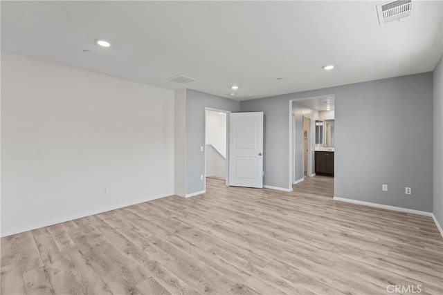 26627 Pearl Blossom Way, Menifee, CA 92585 - spare room featuring light wood finished floors and recessed lighting