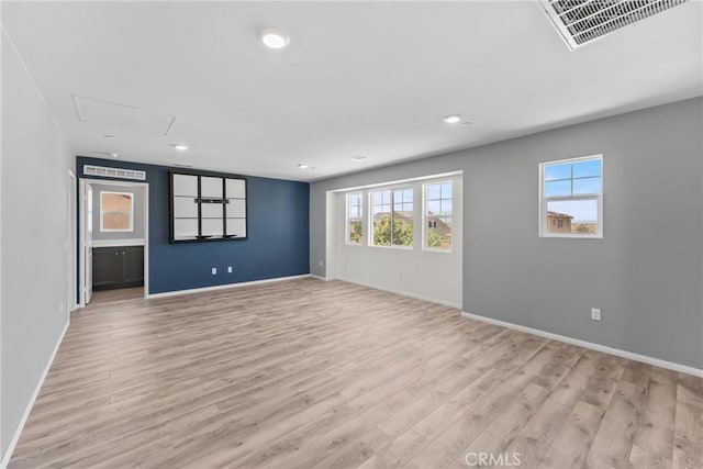 26627 Pearl Blossom Way, Menifee, CA 92585 - unfurnished room with healthy amount of natural light, light wood-style flooring, and recessed lighting