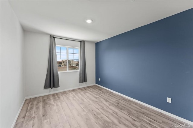 26627 Pearl Blossom Way, Menifee, CA 92585 - empty room featuring wood finished floors and baseboards