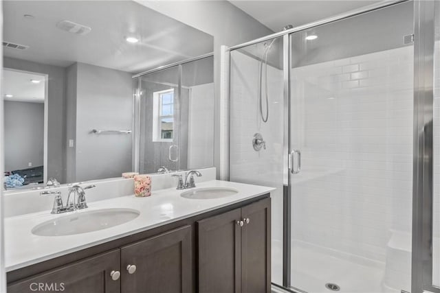 26627 Pearl Blossom Way, Menifee, CA 92585 - bathroom featuring a shower stall and double vanity