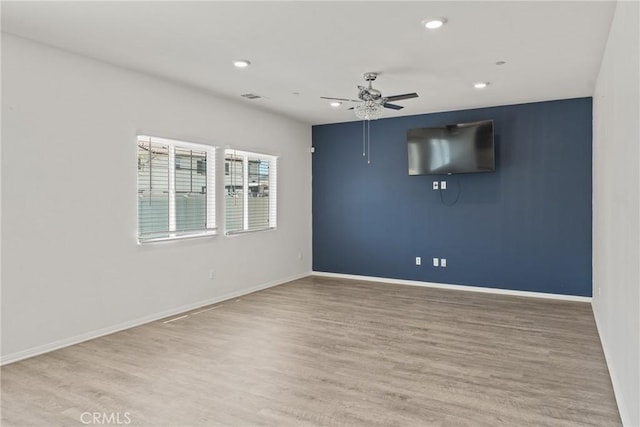 26627 Pearl Blossom Way, Menifee, CA 92585 - unfurnished room with ceiling fan, recessed lighting, and wood finished floors