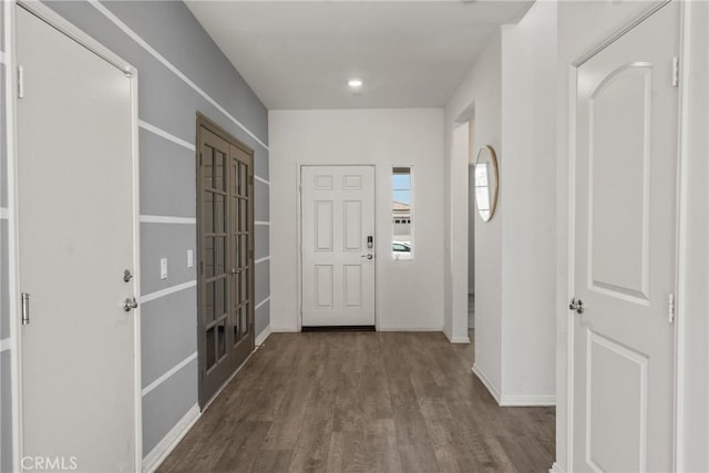 26627 Pearl Blossom Way, Menifee, CA 92585 - entrance foyer featuring wood finished floors and french doors