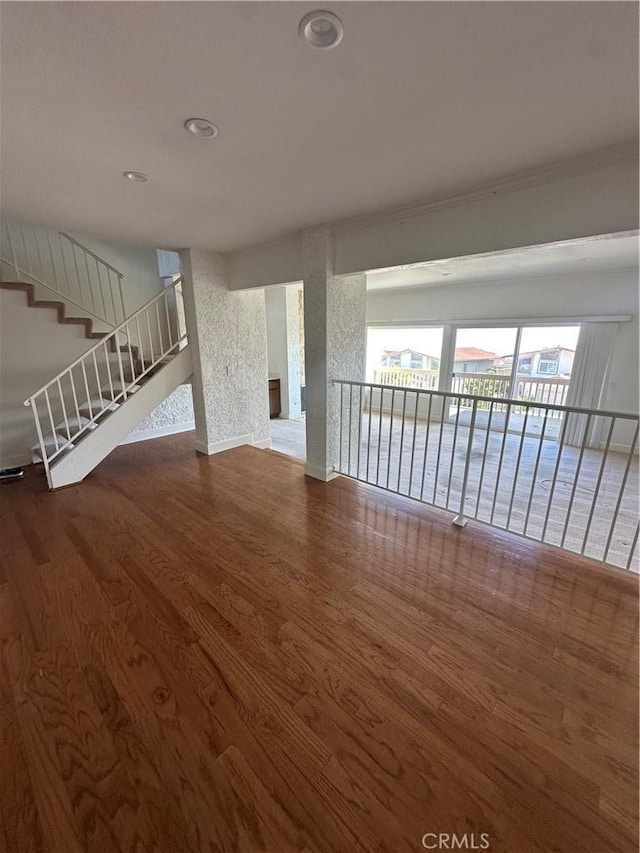 15 Hilltop Cir, Rancho Palos Verdes, CA 90275 - unfurnished living room featuring wood finished floors, recessed lighting, and stairway