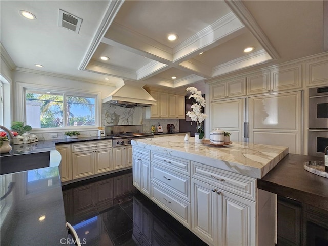 940 N Silent Ranch Dr, Glendora, CA 91741 - kitchen with island exhaust hood, stainless steel appliances, decorative backsplash, ornamental molding, and recessed lighting
