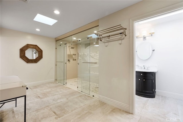 940 N Silent Ranch Dr, Glendora, CA 91741 - bathroom featuring a skylight, a stall shower, vanity, and recessed lighting