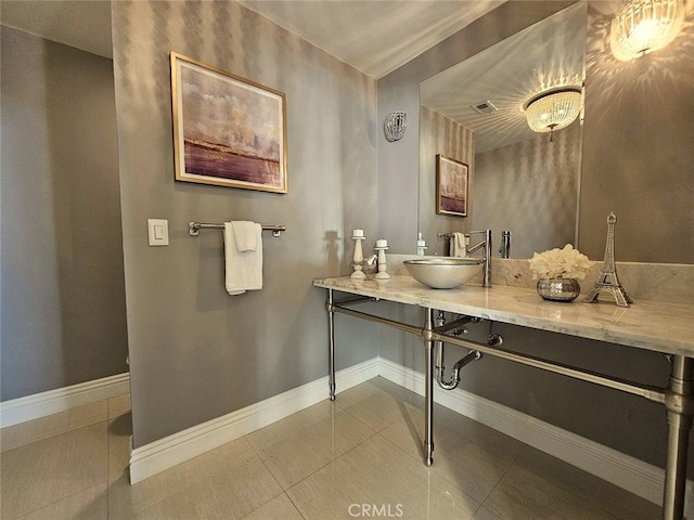 940 N Silent Ranch Dr, Glendora, CA 91741 - bathroom featuring tile patterned floors and vanity