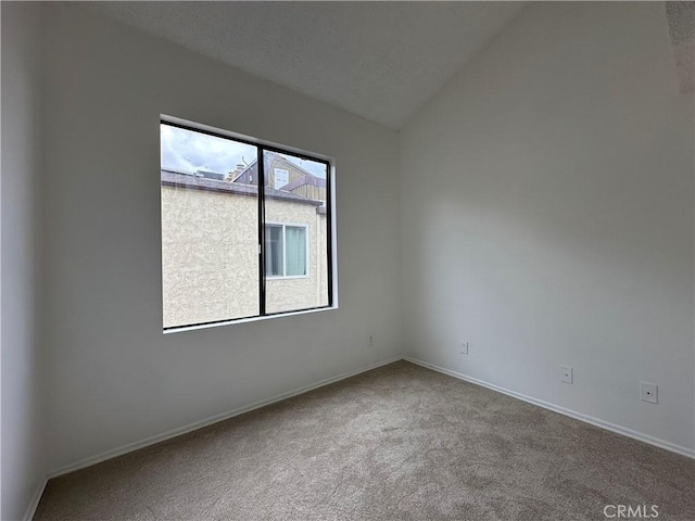 1024 S Marengo Ave Unit 6, Alhambra, CA 91803 - spare room featuring carpet and vaulted ceiling