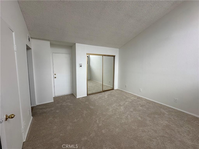 1024 S Marengo Ave Unit 6, Alhambra, CA 91803 - unfurnished bedroom featuring carpet flooring and a textured ceiling