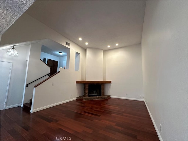 1024 S Marengo Ave Unit 6, Alhambra, CA 91803 - unfurnished living room with wood finished floors, recessed lighting, a fireplace, and stairway