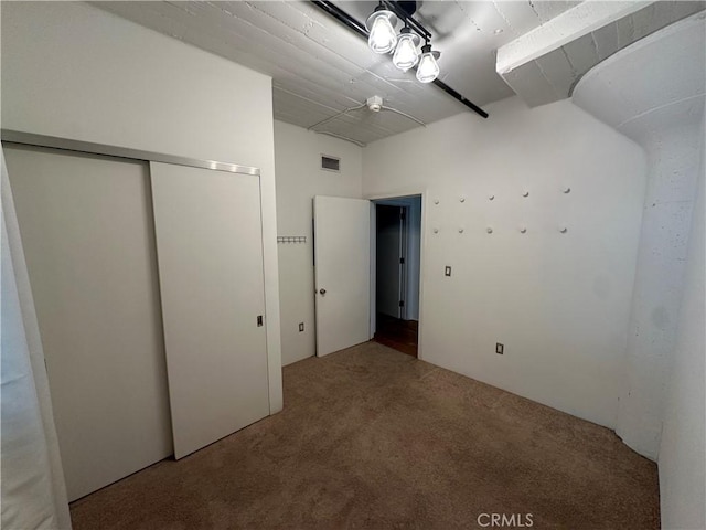 200 N San Fernando Rd Unit 313, Los Angeles, CA 90031 - unfurnished bedroom featuring carpet floors and a closet
