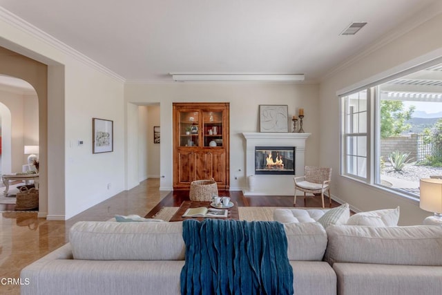 219 Via Rebecca, Thousand Oaks, CA 91320 - living area with arched walkways, crown molding, plenty of natural light, and a glass covered fireplace
