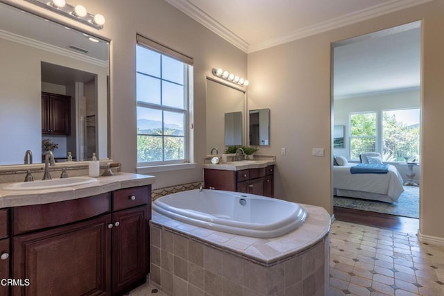 219 Via Rebecca, Thousand Oaks, CA 91320 - bathroom featuring two vanities, plenty of natural light, crown molding, a garden tub, and ensuite bath