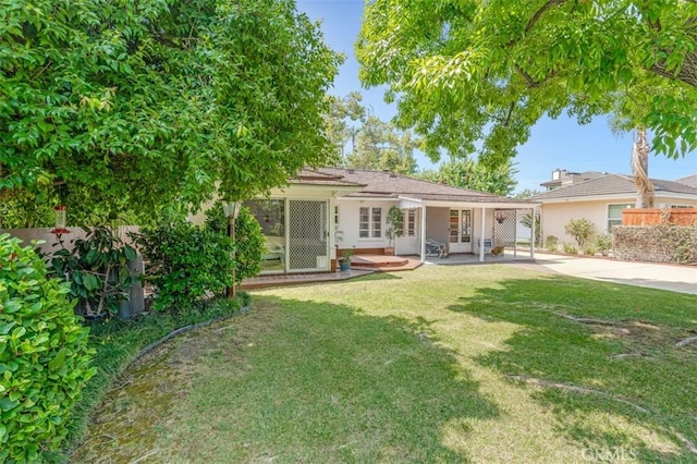 1011 Portola Dr, Arcadia, CA 91007 - rear view of property with a patio, a lawn, french doors, and stucco siding