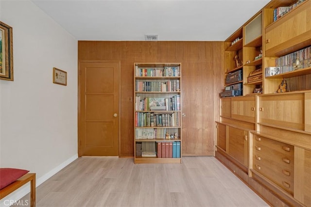 1011 Portola Dr, Arcadia, CA 91007 - sitting room featuring light wood-style floors and wooden walls