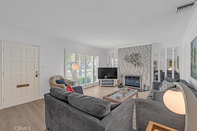 1011 Portola Dr, Arcadia, CA 91007 - living room featuring light wood-style flooring and a stone fireplace
