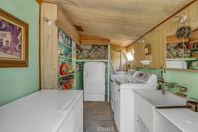 1011 Portola Dr, Arcadia, CA 91007 - washroom featuring separate washer and dryer, wooden ceiling, wood walls, and cabinet space