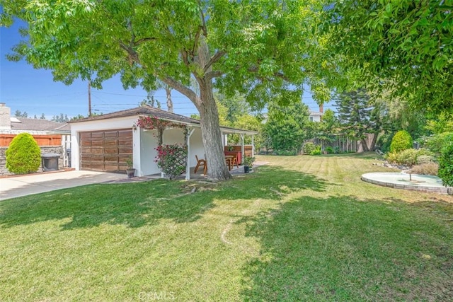 1011 Portola Dr, Arcadia, CA 91007 - view of yard featuring driveway and an attached garage