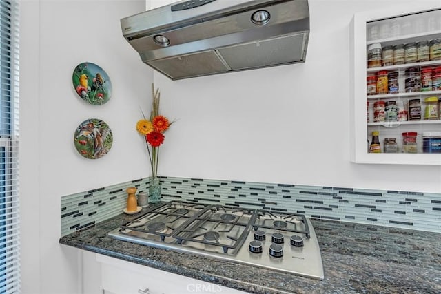 1011 Portola Dr, Arcadia, CA 91007 - detailed view of range hood, stainless steel gas stovetop, backsplash, and dark stone counters