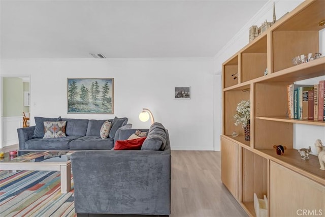 1011 Portola Dr, Arcadia, CA 91007 - living area featuring light wood-style floors and crown molding
