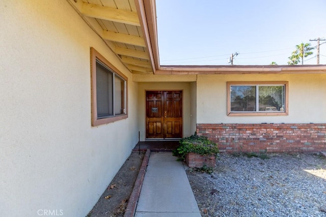 17480 Fontlee Ln, Fontana, CA 92335 - entrance to property featuring stucco siding and brick siding