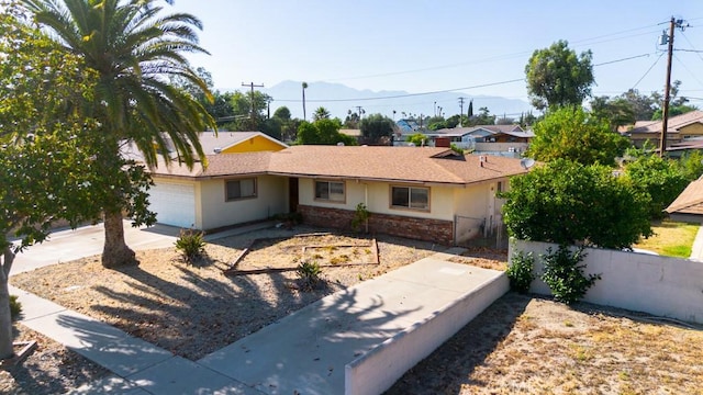 17480 Fontlee Ln, Fontana, CA 92335 - single story home with a garage, stucco siding, and concrete driveway