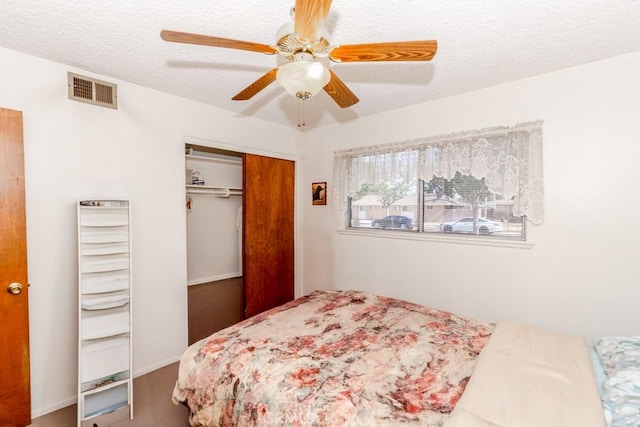 17480 Fontlee Ln, Fontana, CA 92335 - bedroom with a closet, a textured ceiling, and ceiling fan