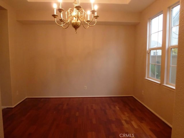 23261 Castle Rock, Mission Viejo, CA 92692 - empty room with dark wood-style flooring and a chandelier