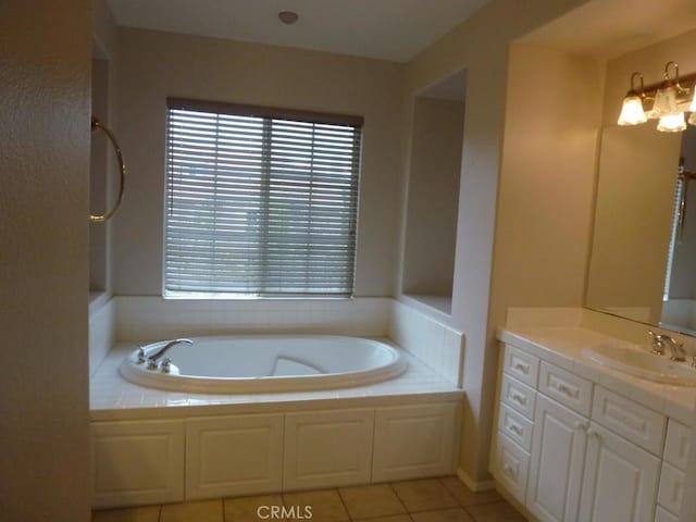 23261 Castle Rock, Mission Viejo, CA 92692 - bathroom with vanity, healthy amount of natural light, a garden tub, and tile patterned floors