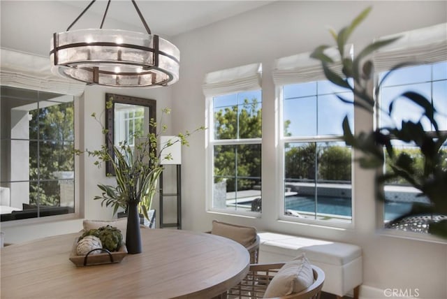 2526 N La Colina Ct, Orange, CA 92867 - dining room with healthy amount of natural light and a chandelier