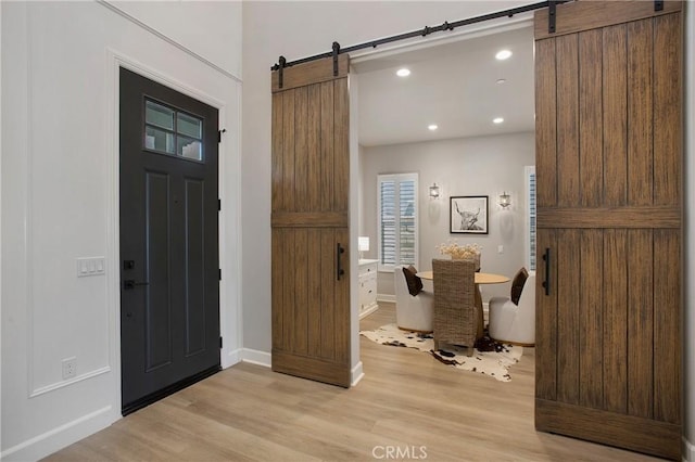 2526 N La Colina Ct, Orange, CA 92867 - foyer featuring a barn door, light wood finished floors, and recessed lighting