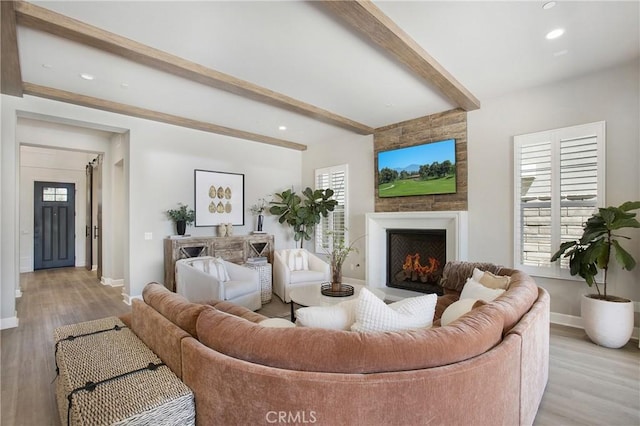 2526 N La Colina Ct, Orange, CA 92867 - living room featuring beam ceiling, a fireplace, recessed lighting, and light wood-style floors