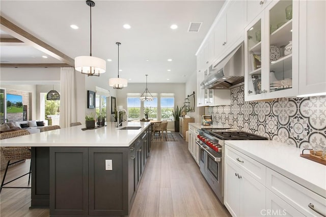 2526 N La Colina Ct, Orange, CA 92867 - kitchen with double oven range, white cabinets, light countertops, light wood-type flooring, and recessed lighting