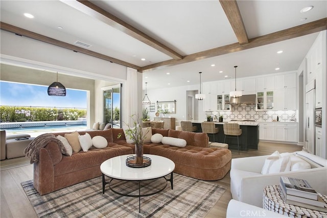 2526 N La Colina Ct, Orange, CA 92867 - living room featuring plenty of natural light, light wood-style flooring, beamed ceiling, and recessed lighting