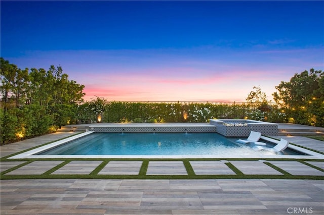2526 N La Colina Ct, Orange, CA 92867 - pool at dusk with a pool with connected hot tub