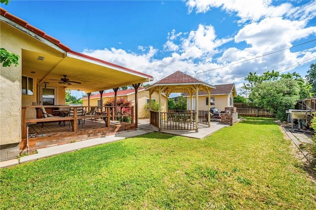 929 9th St, Williams, CA 95987 - view of yard with a ceiling fan, a gazebo, a deck, and a patio area