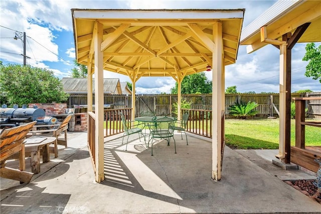 929 9th St, Williams, CA 95987 - fenced backyard featuring outdoor dining area, a gazebo, a patio, and a grill