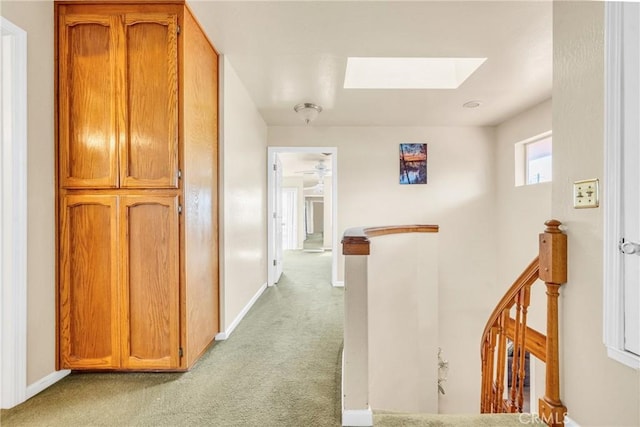 929 9th St, Williams, CA 95987 - hallway with a skylight, an upstairs landing, and light colored carpet