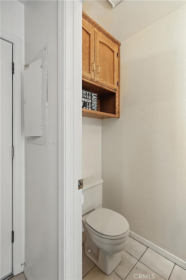 524 St Kevin Ct, Merced, CA 95348 - bathroom featuring baseboards and tile patterned flooring