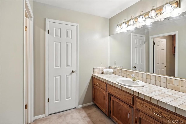524 St Kevin Ct, Merced, CA 95348 - bathroom featuring vanity and baseboards
