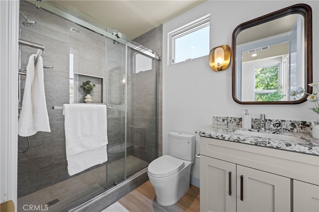 620 Baldwin Ct, Sierra Madre, CA 91024 - full bathroom featuring vanity, wood finished floors, and a stall shower