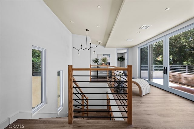 620 Baldwin Ct, Sierra Madre, CA 91024 - stairs with wood finished floors, french doors, and a chandelier