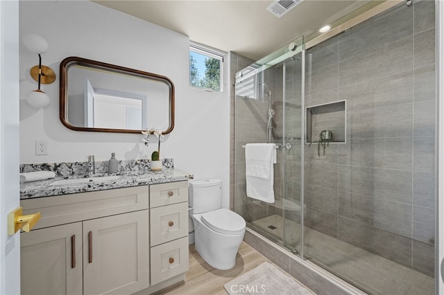 620 Baldwin Ct, Sierra Madre, CA 91024 - bathroom with vanity, a stall shower, and wood finished floors