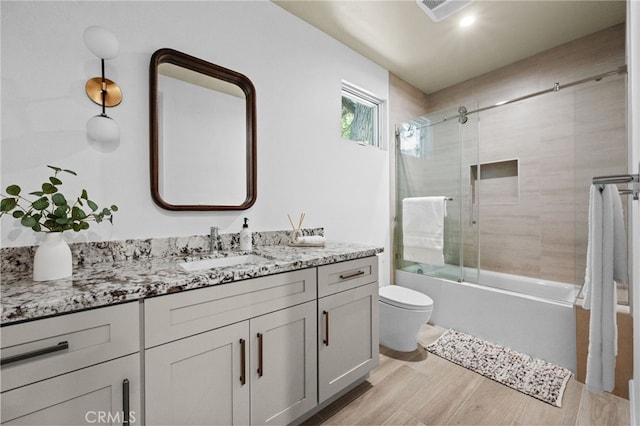 620 Baldwin Ct, Sierra Madre, CA 91024 - bathroom with vanity, combined bath / shower with glass door, and wood finished floors