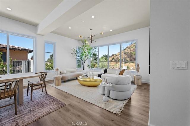 620 Baldwin Ct, Sierra Madre, CA 91024 - living area with plenty of natural light, wood finished floors, recessed lighting, and a chandelier