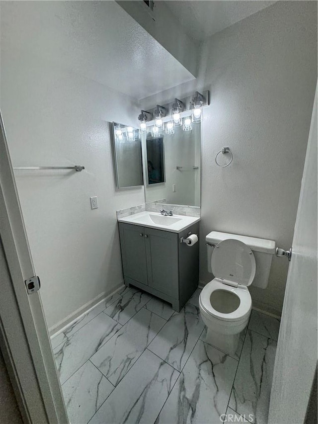 5484 Dobbs St Unit 132, Los Angeles, CA 90032 - bathroom featuring vanity and marble finish flooring