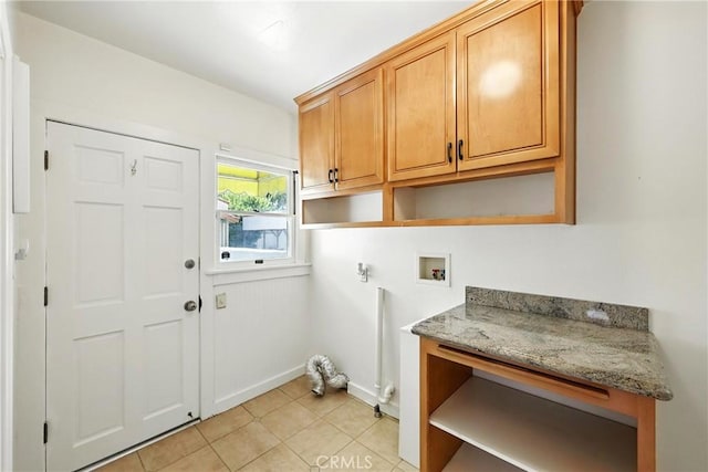 408 N Mccadden Pl, Los Angeles, CA 90004 - laundry room featuring cabinet space, hookup for a washing machine, hookup for an electric dryer, and light tile patterned floors